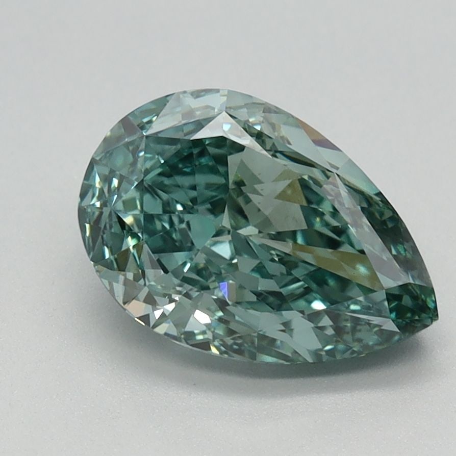 Loose Diamond - PEAR 1.62ct Fancy Vivid Blue Green VVS2: Loose Diamond - PEAR 1.62ct Fancy Vivid Blue Green VVS2 Source: This is a real non-mined Diamond that has been grown in a lab Shape: PEAR Carats: 1.62 Color: Fancy Vivid Blue Green Certification: IGI 