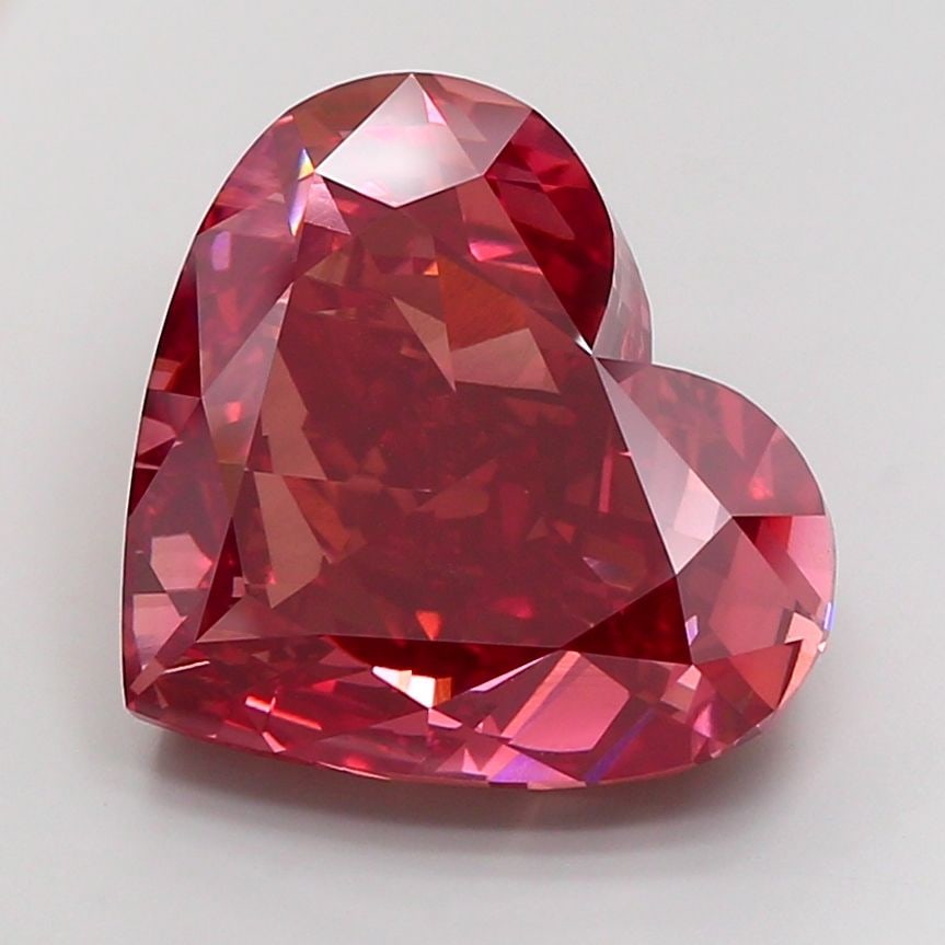 Loose Diamond - HEART 24.26ct Fancy Vivid Pink VVS2: Loose Diamond - HEART 24.26ct Fancy Vivid Pink VVS2 Source: This is a real non-mined Diamond that has been grown in a lab Shape: HEART Carats: 24.26 Color: Fancy Vivid Pink Certification: IGI Video: