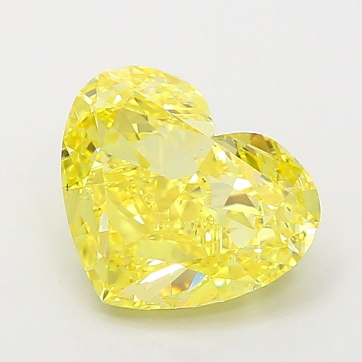 Loose Diamond - HEART 2.56ct Fancy Vivid Yellow VS1: Loose Diamond - HEART 2.56ct Fancy Vivid Yellow VS1 Source: This is a real non-mined Diamond that has been grown in a lab Shape: HEART Carats: 2.56 Color: Fancy Vivid Yellow Certification: IGI Video: