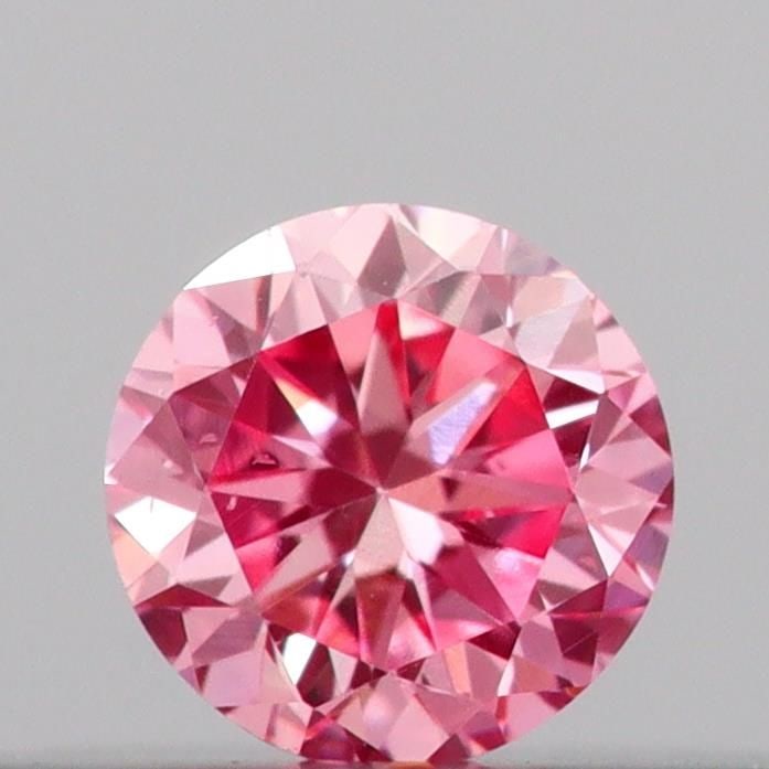 Loose Diamond - ROUND 0.1ct Fancy Vivid Pink VS2: Loose Diamond - ROUND 0.1ct Fancy Vivid Pink VS2 Source: This is a real non-mined Diamond that has been grown in a lab Shape: ROUND Carats: 0.1 Color: Fancy Vivid Pink Certification: IGI Video: Video