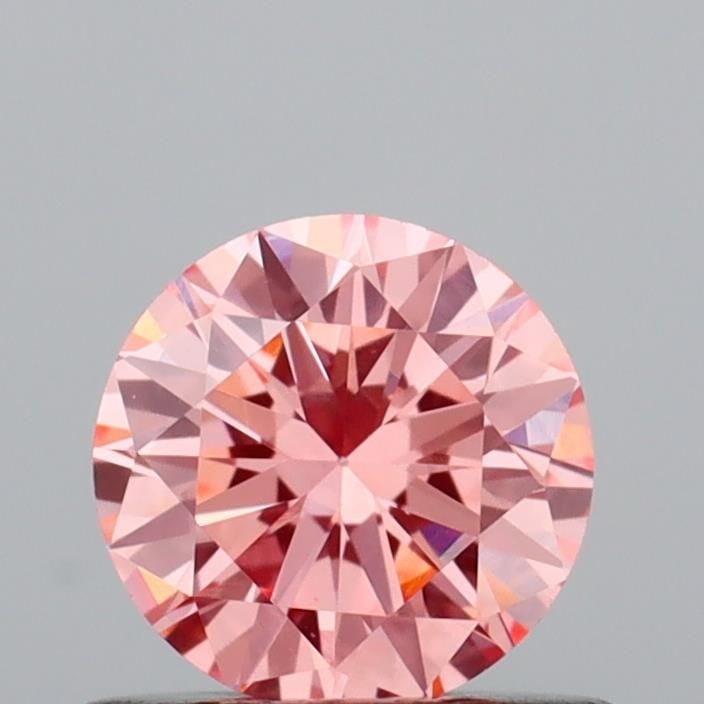 Loose Diamond - ROUND 0.55ct Fancy Vivid Pink VS1: Loose Diamond - ROUND 0.55ct Fancy Vivid Pink VS1 Source: This is a real non-mined Diamond that has been grown in a lab Shape: ROUND Carats: 0.55 Color: Fancy Vivid Pink Certification: IGI Video: