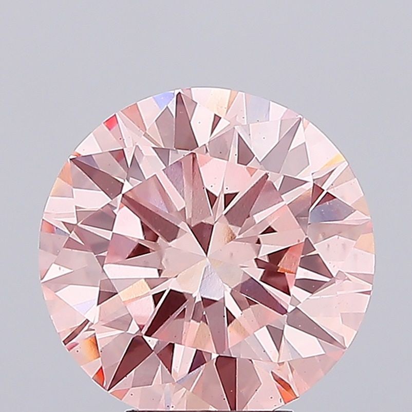 Loose Diamond - ROUND 5.99ct Fancy Vivid Pink VS2: Loose Diamond - ROUND 5.99ct Fancy Vivid Pink VS2 Source: This is a real non-mined Diamond that has been grown in a lab Shape: ROUND Carats: 5.99 Color: Fancy Vivid Pink Certification: IGI Video: