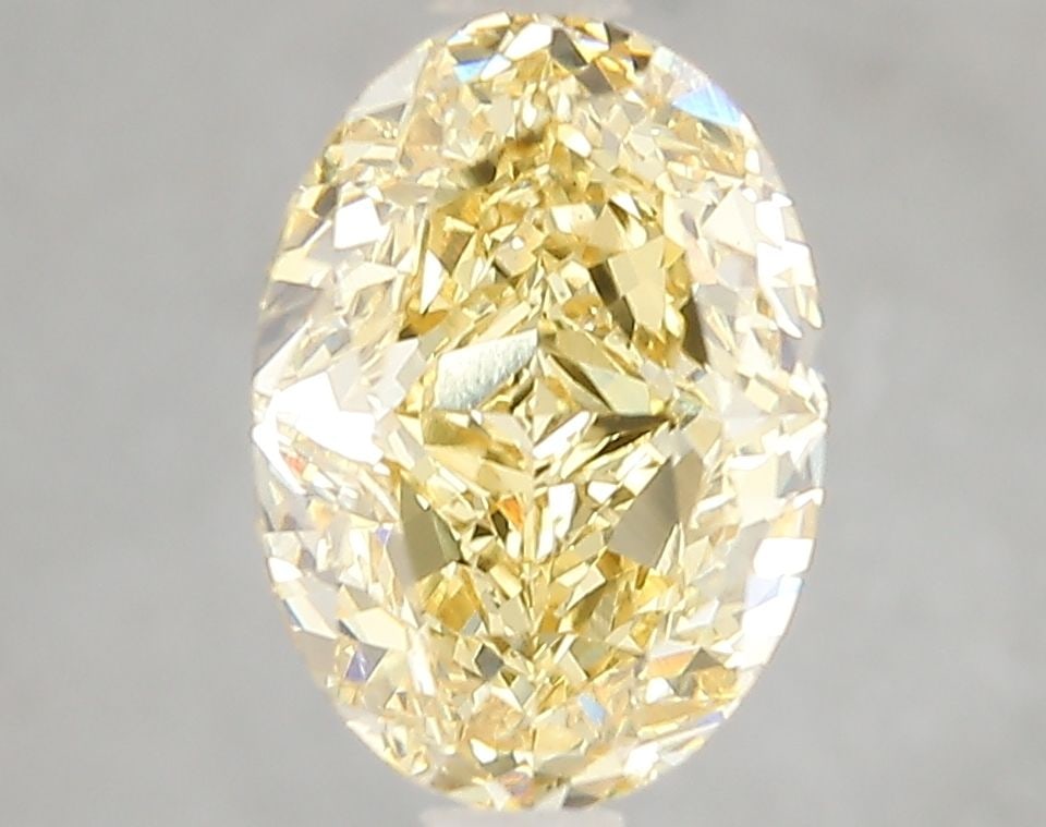 Loose Diamond - OVAL 3.1ct Fancy Intense Yellow VS1: Loose Diamond - OVAL 3.1ct Fancy Intense Yellow VS1 Source: This is a real non-mined Diamond that has been grown in a lab Shape: OVAL Carats: 3.1 Color: Fancy Intense Yellow Certification: IGI Video: