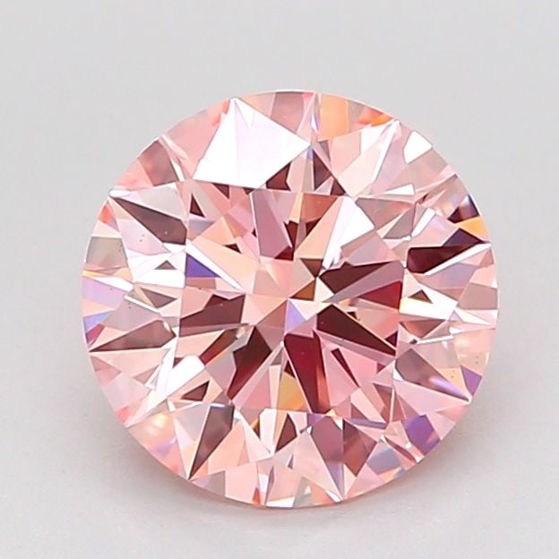 Ideal Loose Diamond - ROUND 1.73ct Fancy Vivid Pink VS2: Ideal Loose Diamond - ROUND 1.73ct Fancy Vivid Pink VS2 Source: This is a real non-mined Diamond that has been grown in a lab Shape: ROUND Carats: 1.73 Color: Fancy Vivid Pink Certification: IGI