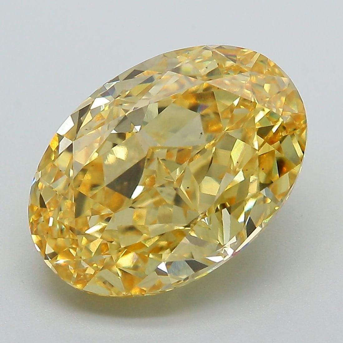 Loose Diamond - OVAL 7.18ct Fancy Vivid Yellow VS1: Loose Diamond - OVAL 7.18ct Fancy Vivid Yellow VS1 Source: This is a real non-mined Diamond that has been grown in a lab Shape: OVAL Carats: 7.18 Color: Fancy Vivid Yellow Certification: IGI Video: