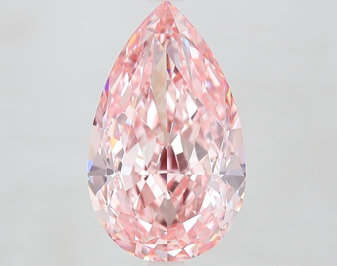 Loose Diamond - PEAR 6.09ct Fancy Vivid Pink VVS2: Loose Diamond - PEAR 6.09ct Fancy Vivid Pink VVS2 Source: This is a real non-mined Diamond that has been grown in a lab Shape: PEAR Carats: 6.09 Color: Fancy Vivid Pink Certification: IGI Video: