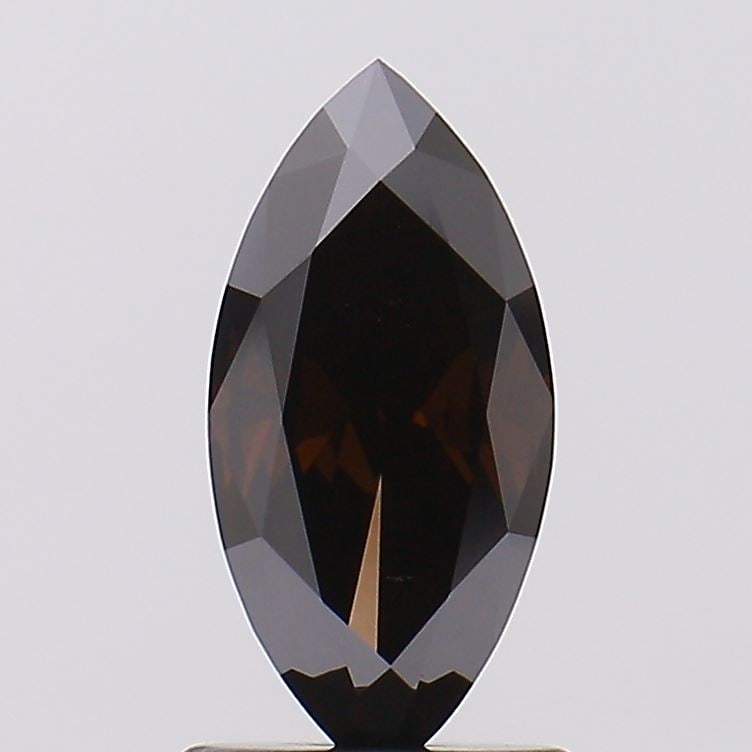 Loose Diamond - MARQUISE 1.09ct Fancy Deep Brown VS1: Loose Diamond - MARQUISE 1.09ct Fancy Deep Brown VS1 Source: This is a real non-mined Diamond that has been grown in a lab Shape: MARQUISE Carats: 1.09 Color: Fancy Deep Brown Certification: NONE