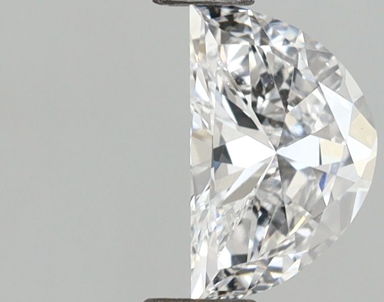 Loose Diamond - HALF MOON 0.63ct E VVS1: Loose Diamond - HALF MOON 0.63ct E VVS1 Source: This is a real non-mined Diamond that has been grown in a lab Shape: HALF MOON Carats: 0.63 Color: E Clarity: VVS1 Certification: IGI Video: