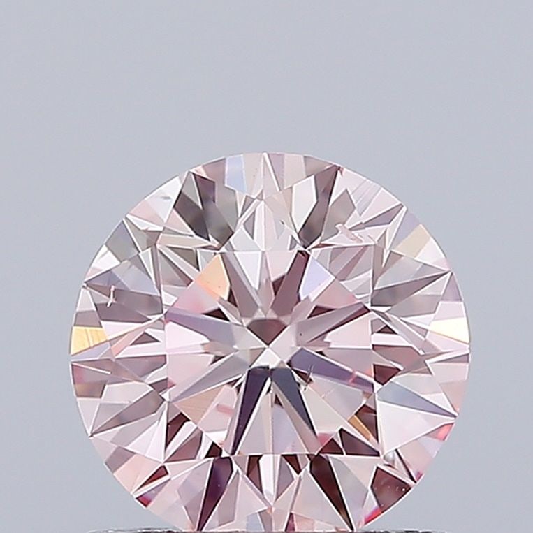 Loose Diamond - ROUND 1.0ct Fancy Vivid Pink SI1: Loose Diamond - ROUND 1.0ct Fancy Vivid Pink SI1 Source: This is a real non-mined Diamond that has been grown in a lab Shape: ROUND Carats: 1.0 Color: Fancy Vivid Pink Certification: IGI Video: