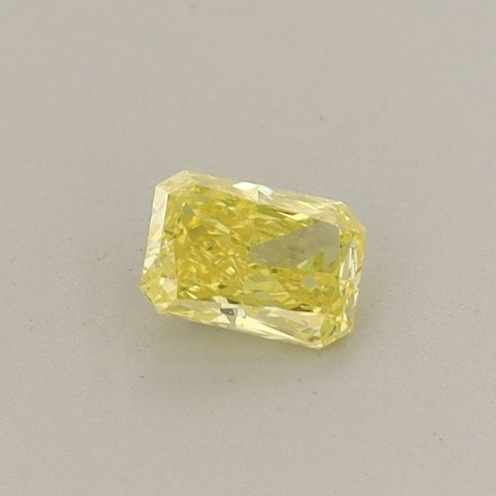 Loose Diamond - RADIANT 0.22ct Fancy Vivid Yellow VVS2: Loose Diamond - RADIANT 0.22ct Fancy Vivid Yellow VVS2 Source: This is a real non-mined Diamond that has been grown in a lab Shape: RADIANT Carats: 0.22 Color: Fancy Vivid Yellow Certification: IGI