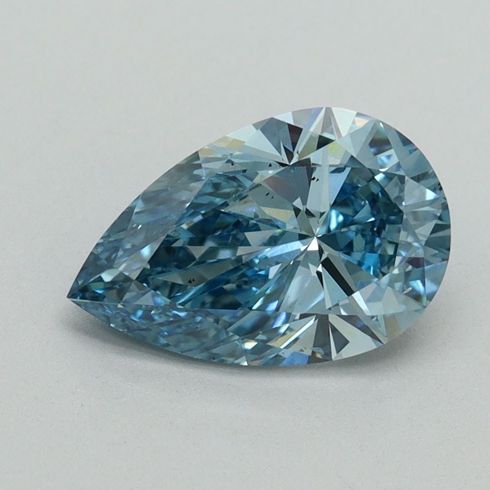Loose Diamond - PEAR 1.67ct Fancy Vivid Blue SI1: Loose Diamond - PEAR 1.67ct Fancy Vivid Blue SI1 Source: This is a real non-mined Diamond that has been grown in a lab Shape: PEAR Carats: 1.67 Color: Fancy Vivid Blue Certification: IGI Video: Video