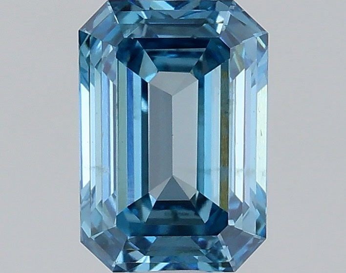 Loose Diamond - EMERALD 0.85ct Fancy Vivid Blue VS2: Loose Diamond - EMERALD 0.85ct Fancy Vivid Blue VS2 Source: This is a real non-mined Diamond that has been grown in a lab Shape: EMERALD Carats: 0.85 Color: Fancy Vivid Blue Certification: IGI Video: