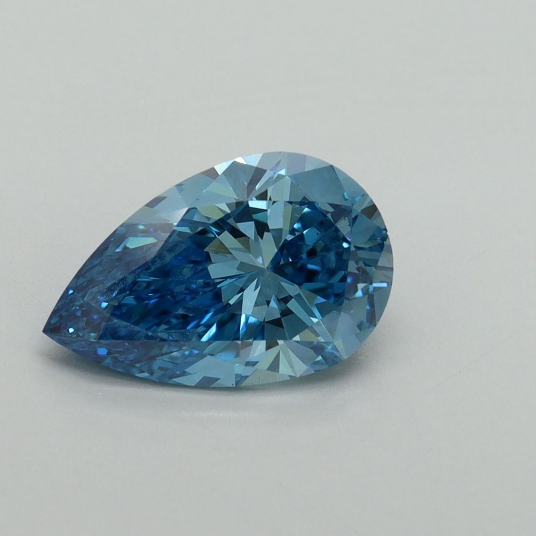 Loose Diamond - PEAR 2.09ct Fancy Vivid Blue VS2: Loose Diamond - PEAR 2.09ct Fancy Vivid Blue VS2 Source: This is a real non-mined Diamond that has been grown in a lab Shape: PEAR Carats: 2.09 Color: Fancy Vivid Blue Certification: IGI Video: