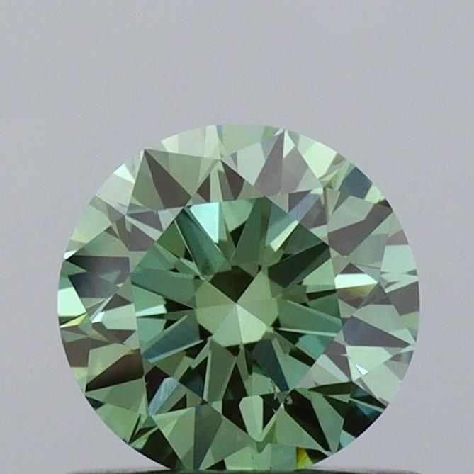 Ideal Loose Diamond - ROUND 0.61ct Fancy Vivid Green VS1: Ideal Loose Diamond - ROUND 0.61ct Fancy Vivid Green VS1 Source: This is a real non-mined Diamond that has been grown in a lab Shape: ROUND Carats: 0.61 Color: Fancy Vivid Green Certification: IGI