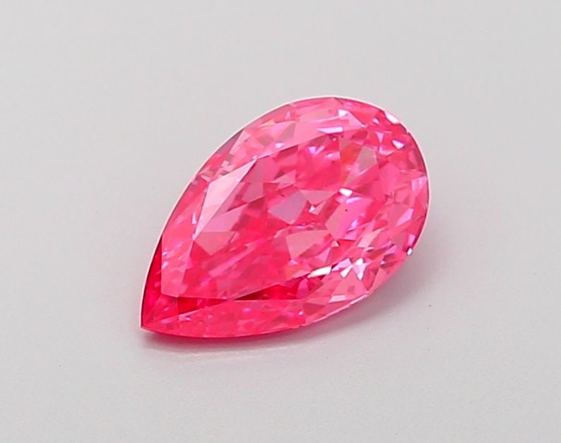 Loose Diamond - PEAR 1.02ct Fancy Vivid Pink VS2: Loose Diamond - PEAR 1.02ct Fancy Vivid Pink VS2 Source: This is a real non-mined Diamond that has been grown in a lab Shape: PEAR Carats: 1.02 Color: Fancy Vivid Pink Certification: IGI Video: Video