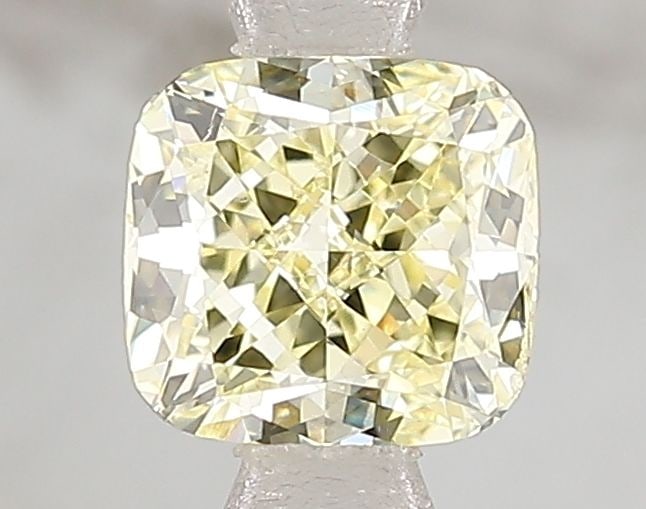 Loose Diamond - CUSHION BRILLIANT 1.02ct Fancy Yellow VS2: Loose Diamond - CUSHION BRILLIANT 1.02ct Fancy Yellow VS2 Source: This is a real non-mined Diamond that has been grown in a lab Shape: CUSHION BRILLIANT Carats: 1.02 Color: Fancy Yellow Certification: