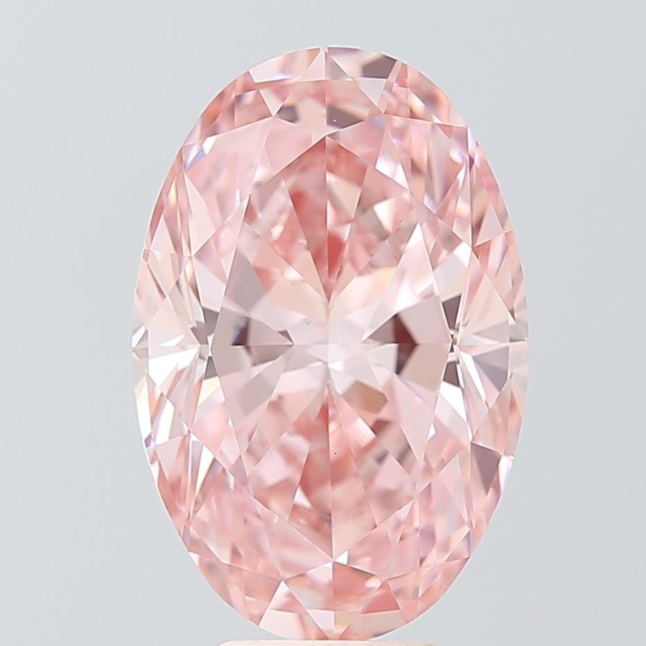 Loose Diamond - OVAL 7.01ct Fancy Vivid Pink VS1: Loose Diamond - OVAL 7.01ct Fancy Vivid Pink VS1 Source: This is a real non-mined Diamond that has been grown in a lab Shape: OVAL Carats: 7.01 Color: Fancy Vivid Pink Certification: IGI Video: