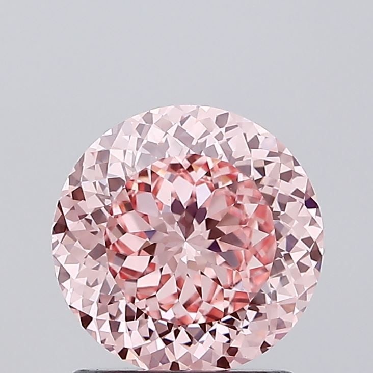 Loose Diamond - ROUND 1.58ct Fancy Vivid Pink VVS2: Loose Diamond - ROUND 1.58ct Fancy Vivid Pink VVS2 Source: This is a real non-mined Diamond that has been grown in a lab Shape: ROUND Carats: 1.58 Color: Fancy Vivid Pink Certification: IGI Video: