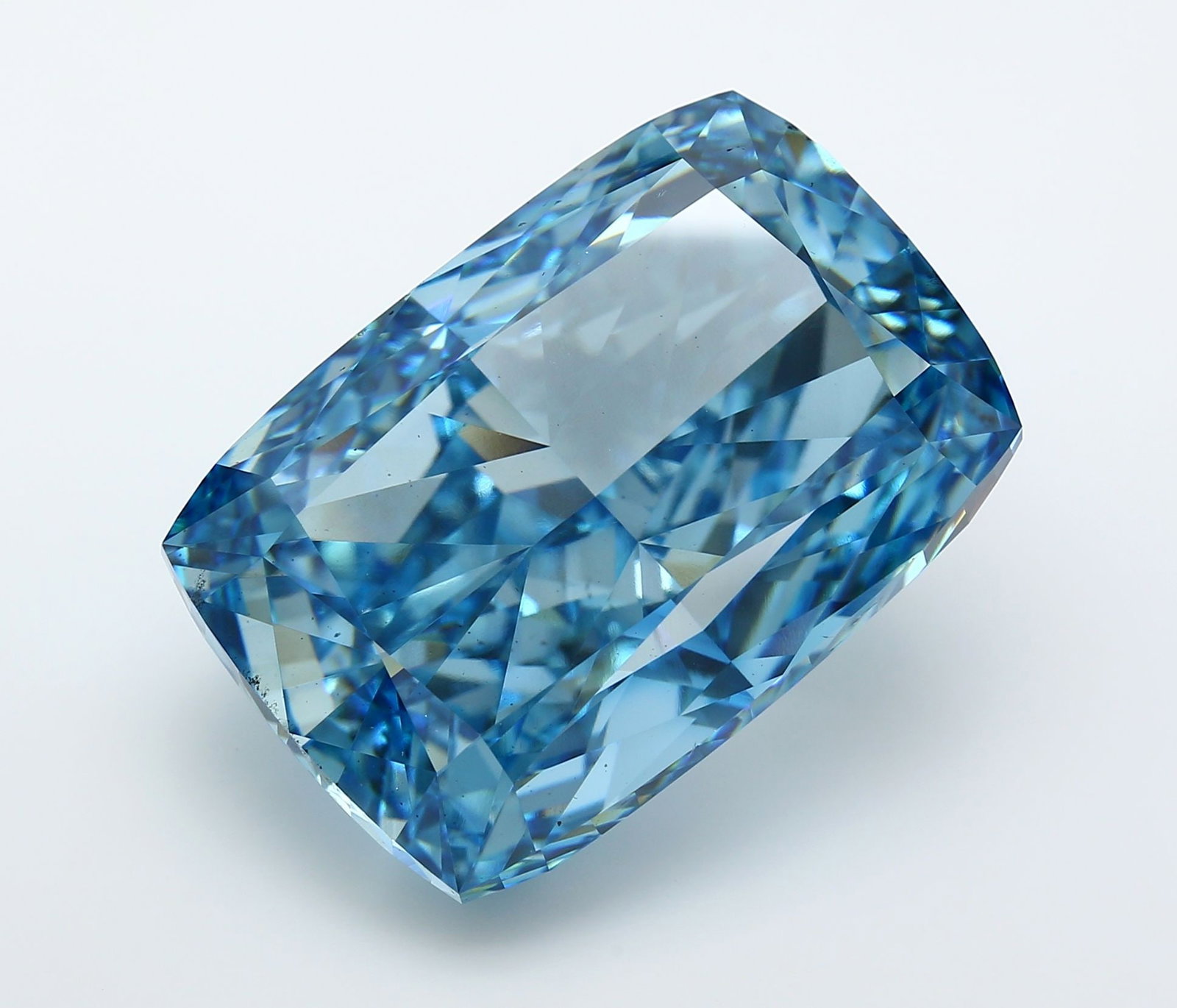 Loose Diamond - CUSHION MODIFIED 50.2ct Fancy Vivid Blue VS2: Loose Diamond - CUSHION MODIFIED 50.2ct Fancy Vivid Blue VS2 Source: This is a real non-mined Diamond that has been grown in a lab Shape: CUSHION MODIFIED Carats: 50.2 Color: Fancy Vivid Blue Certific