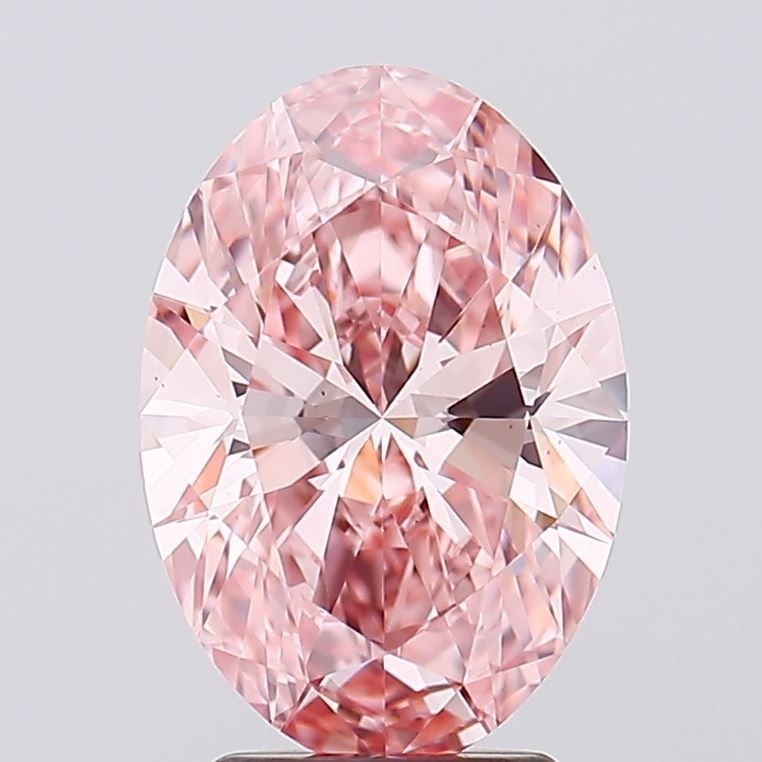 Loose Diamond - OVAL 3.09ct Fancy Vivid Pink VS2: Loose Diamond - OVAL 3.09ct Fancy Vivid Pink VS2 Source: This is a real non-mined Diamond that has been grown in a lab Shape: OVAL Carats: 3.09 Color: Fancy Vivid Pink Certification: IGI Video: