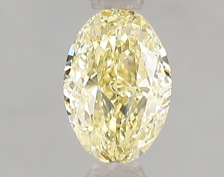 Loose Diamond - OVAL 1.06ct Fancy Intense Yellow VS2: Loose Diamond - OVAL 1.06ct Fancy Intense Yellow VS2 Source: This is a real non-mined Diamond that has been grown in a lab Shape: OVAL Carats: 1.06 Color: Fancy Intense Yellow Certification: IGI Video