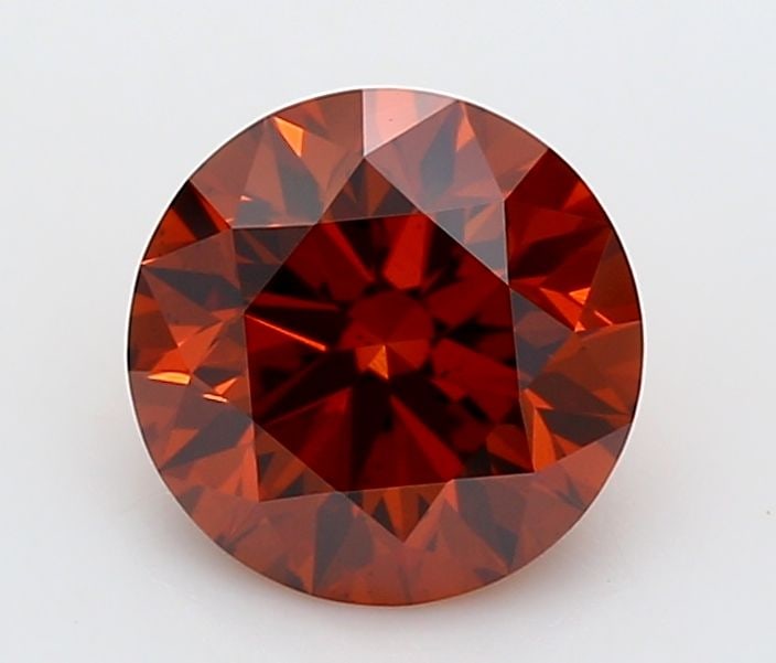 Loose Diamond - ROUND 0.67ct Fancy Vivid Orange VS2: Loose Diamond - ROUND 0.67ct Fancy Vivid Orange VS2 Source: This is a real non-mined Diamond that has been grown in a lab Shape: ROUND Carats: 0.67 Color: Fancy Vivid Orange Certification: IGI Video:
