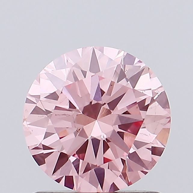 Loose Diamond - ROUND 0.89ct Fancy Intense Pink VS1: Loose Diamond - ROUND 0.89ct Fancy Intense Pink VS1 Source: This is a real non-mined Diamond that has been grown in a lab Shape: ROUND Carats: 0.89 Color: Fancy Intense Pink Certification: NONE Video: