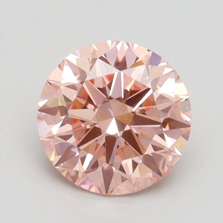Loose Diamond - ROUND 2.21ct Fancy Vivid Pink VS2: Loose Diamond - ROUND 2.21ct Fancy Vivid Pink VS2 Source: This is a real non-mined Diamond that has been grown in a lab Shape: ROUND Carats: 2.21 Color: Fancy Vivid Pink Certification: IGI Video: