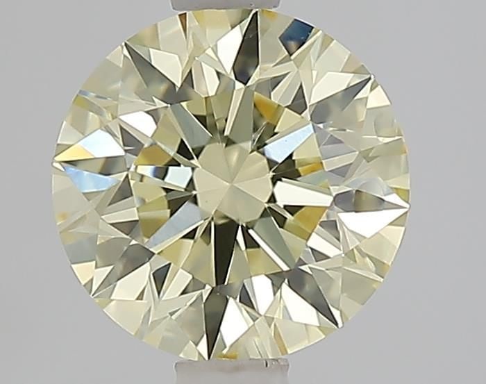 Ideal Loose Diamond - ROUND 1.52ct Fancy Light Yellow VS2: Ideal Loose Diamond - ROUND 1.52ct Fancy Light Yellow VS2 Source: This is a real non-mined Diamond that has been grown in a lab Shape: ROUND Carats: 1.52 Color: Fancy Light Yellow Certification: IGI V