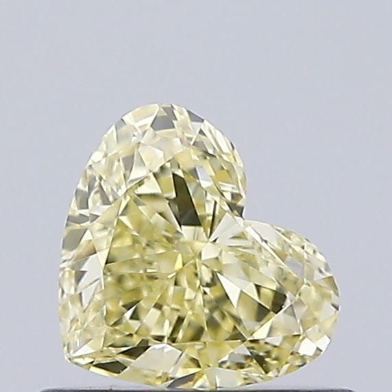 Loose Diamond - HEART 0.46ct Fancy Yellow VS1: Loose Diamond - HEART 0.46ct Fancy Yellow VS1 Source: This is a real non-mined Diamond that has been grown in a lab Shape: HEART Carats: 0.46 Color: Fancy Yellow Certification: IGI Video:
