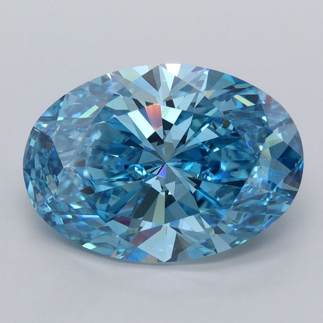 Loose Diamond - OVAL 5.07ct Fancy Vivid Blue VVS2: Loose Diamond - OVAL 5.07ct Fancy Vivid Blue VVS2 Source: This is a real non-mined Diamond that has been grown in a lab Shape: OVAL Carats: 5.07 Color: Fancy Vivid Blue Certification: IGI Video: