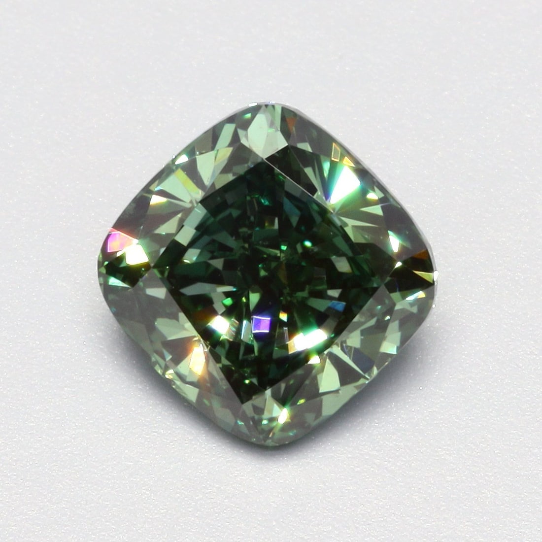 Loose Diamond - CUSHION MODIFIED 1.99ct Fancy Vivid Green VS2: Loose Diamond - CUSHION MODIFIED 1.99ct Fancy Vivid Green VS2 Source: This is a real non-mined Diamond that has been grown in a lab Shape: CUSHION MODIFIED Carats: 1.99 Color: Fancy Vivid Green Certif