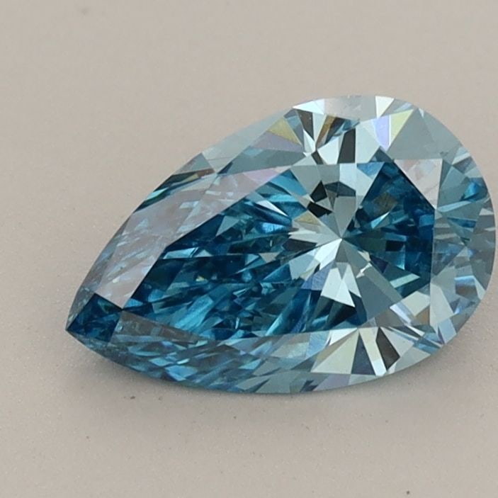Loose Diamond - PEAR 0.99ct Fancy Vivid Blue VS1: Loose Diamond - PEAR 0.99ct Fancy Vivid Blue VS1 Source: This is a real non-mined Diamond that has been grown in a lab Shape: PEAR Carats: 0.99 Color: Fancy Vivid Blue Certification: IGI The Diamond