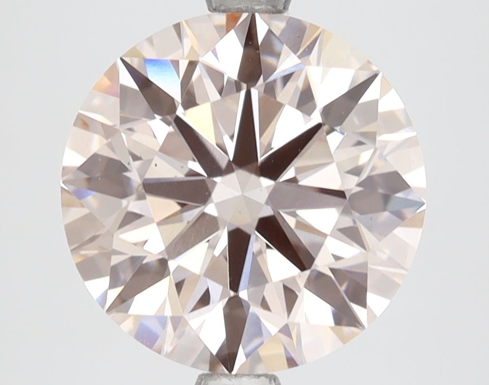 Loose Diamond - ROUND 3.58ct Fancy Light Pink VS2: Loose Diamond - ROUND 3.58ct Fancy Light Pink VS2 Source: This is a real non-mined Diamond that has been grown in a lab Shape: ROUND Carats: 3.58 Color: Fancy Light Pink Certification: IGI Video: