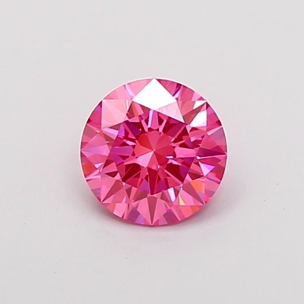 Loose Diamond - ROUND 1.04ct Fancy Vivid Pink VS1: Loose Diamond - ROUND 1.04ct Fancy Vivid Pink VS1 Source: This is a real non-mined Diamond that has been grown in a lab Shape: ROUND Carats: 1.04 Color: Fancy Vivid Pink Certification: IGI Video: