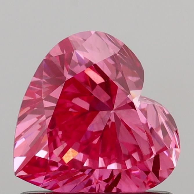 Loose Diamond - HEART 0.88ct Fancy Vivid Pink VS1: Loose Diamond - HEART 0.88ct Fancy Vivid Pink VS1 Source: This is a real non-mined Diamond that has been grown in a lab Shape: HEART Carats: 0.88 Color: Fancy Vivid Pink Certification: IGI Video: