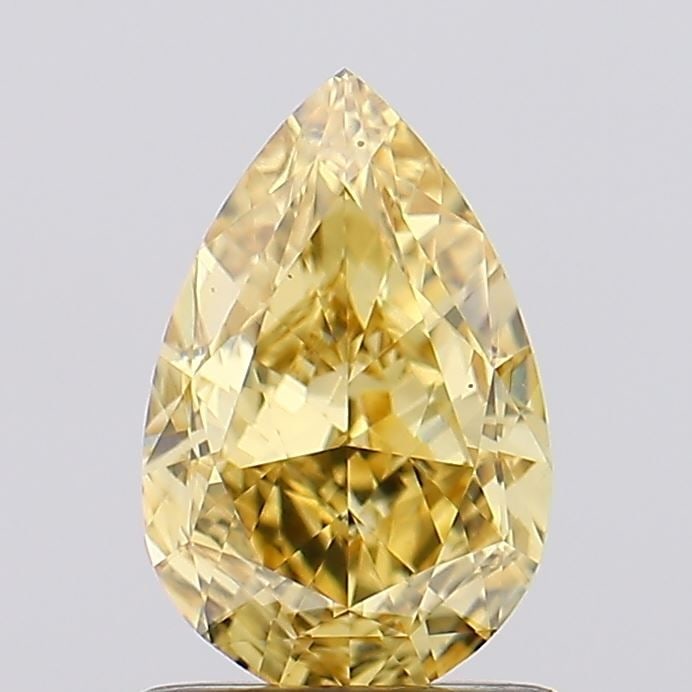 Loose Diamond - PEAR 1.27ct Fancy Vivid Yellow VS1: Loose Diamond - PEAR 1.27ct Fancy Vivid Yellow VS1 Source: This is a real non-mined Diamond that has been grown in a lab Shape: PEAR Carats: 1.27 Color: Fancy Vivid Yellow Certification: IGI Video: