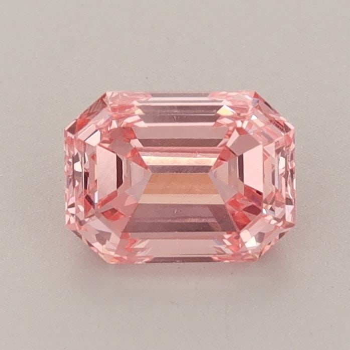 Loose Diamond - EMERALD 0.94ct Fancy Vivid Pink VS2: Loose Diamond - EMERALD 0.94ct Fancy Vivid Pink VS2 Source: This is a real non-mined Diamond that has been grown in a lab Shape: EMERALD Carats: 0.94 Color: Fancy Vivid Pink Certification: IGI Video: