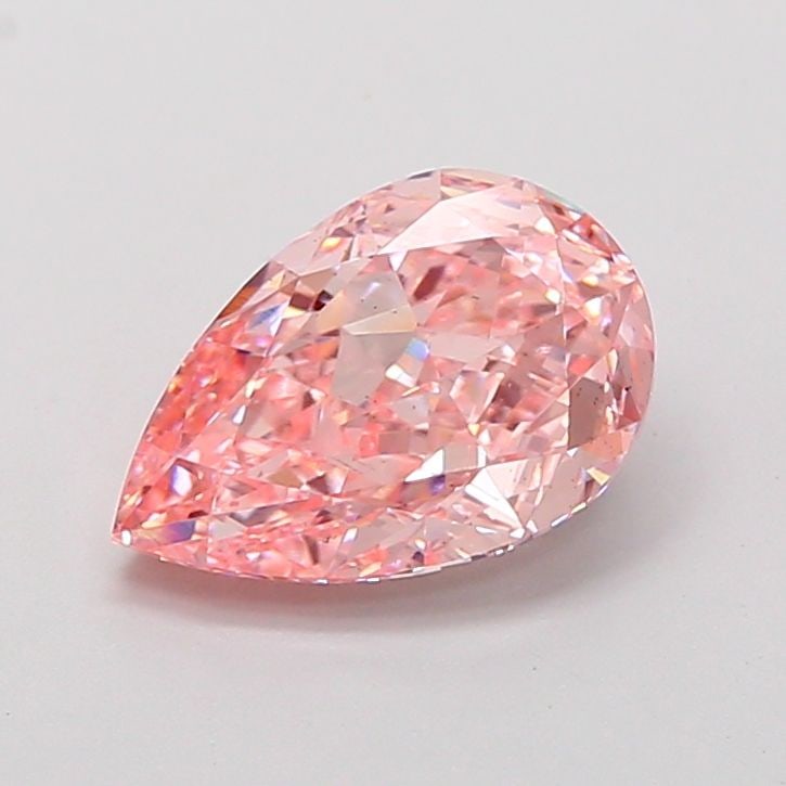 Loose Diamond - PEAR 3.08ct Fancy Vivid Pink VS2: Loose Diamond - PEAR 3.08ct Fancy Vivid Pink VS2 Source: This is a real non-mined Diamond that has been grown in a lab Shape: PEAR Carats: 3.08 Color: Fancy Vivid Pink Certification: IGI Video: