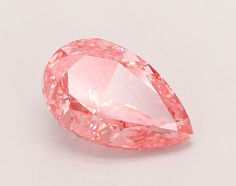 Loose Diamond - PEAR 1.8ct Fancy Vivid Pink VVS2: Loose Diamond - PEAR 1.8ct Fancy Vivid Pink VVS2 Source: This is a real non-mined Diamond that has been grown in a lab Shape: PEAR Carats: 1.8 Color: Fancy Vivid Pink Certification: IGI Video: