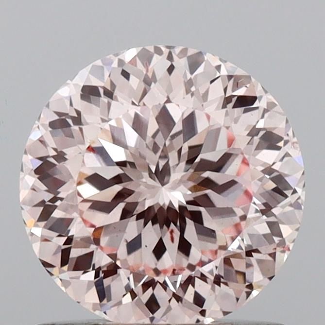 Loose Diamond - ROUND 1.02ct Fancy Pink VS2: Loose Diamond - ROUND 1.02ct Fancy Pink VS2 Source: This is a real non-mined Diamond that has been grown in a lab Shape: ROUND Carats: 1.02 Color: Fancy Pink Certification: IGI Video: