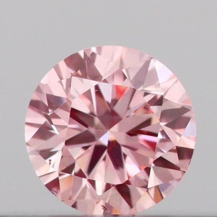 Loose Diamond - ROUND 0.11ct Fancy Intense Pink VS2: Loose Diamond - ROUND 0.11ct Fancy Intense Pink VS2 Source: This is a real non-mined Diamond that has been grown in a lab Shape: ROUND Carats: 0.11 Color: Fancy Intense Pink Certification: IGI Video: