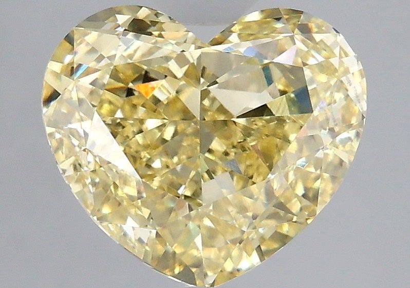 Loose Diamond - HEART 3.59ct Fancy Yellow VS1: Loose Diamond - HEART 3.59ct Fancy Yellow VS1 Source: This is a real non-mined Diamond that has been grown in a lab Shape: HEART Carats: 3.59 Color: Fancy Yellow Certification: IGI Video: