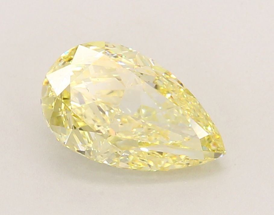 Loose Diamond - PEAR 1.89ct Fancy Yellow VS1: Loose Diamond - PEAR 1.89ct Fancy Yellow VS1 Source: This is a real non-mined Diamond that has been grown in a lab Shape: PEAR Carats: 1.89 Color: Fancy Yellow Certification: IGI Video: