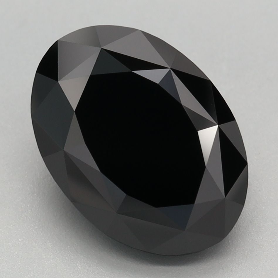 Loose Diamond - OVAL 3.11ct Fancy Black: Loose Diamond - OVAL 3.11ct Fancy Black Source: This is a real non-mined Diamond that has been grown in a lab Shape: OVAL Carats: 3.11 Color: Fancy Black Certification: IGI Video: