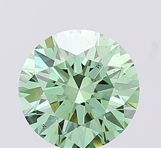 Ideal Loose Diamond - ROUND 1.29ct Fancy Vivid Green VS2: Ideal Loose Diamond - ROUND 1.29ct Fancy Vivid Green VS2 Source: This is a real non-mined Diamond that has been grown in a lab Shape: ROUND Carats: 1.29 Color: Fancy Vivid Green Certification: IGI Vid