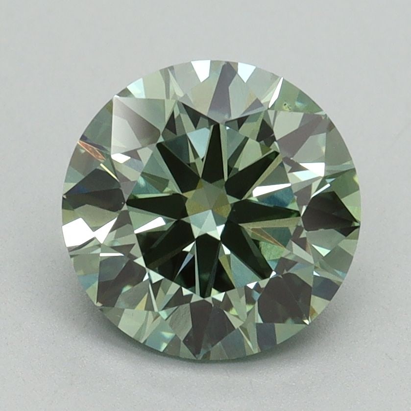 Ideal Loose Diamond - ROUND 2.03ct Fancy Vivid Green VS1: Ideal Loose Diamond - ROUND 2.03ct Fancy Vivid Green VS1 Source: This is a real non-mined Diamond that has been grown in a lab Shape: ROUND Carats: 2.03 Color: Fancy Vivid Green Certification: IGI Vid