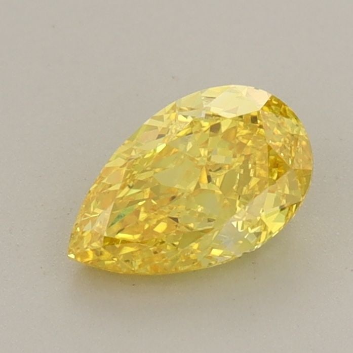 Loose Diamond - PEAR 0.73ct Fancy Vivid Yellow VS1: Loose Diamond - PEAR 0.73ct Fancy Vivid Yellow VS1 Source: This is a real non-mined Diamond that has been grown in a lab Shape: PEAR Carats: 0.73 Color: Fancy Vivid Yellow Certification: IGI Video: