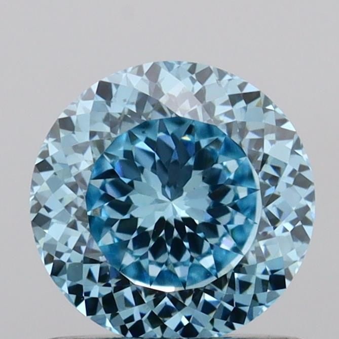 Loose Diamond - ROUND 0.9ct Fancy Vivid Blue VS1: Loose Diamond - ROUND 0.9ct Fancy Vivid Blue VS1 Source: This is a real non-mined Diamond that has been grown in a lab Shape: ROUND Carats: 0.9 Color: Fancy Vivid Blue Certification: IGI Video: