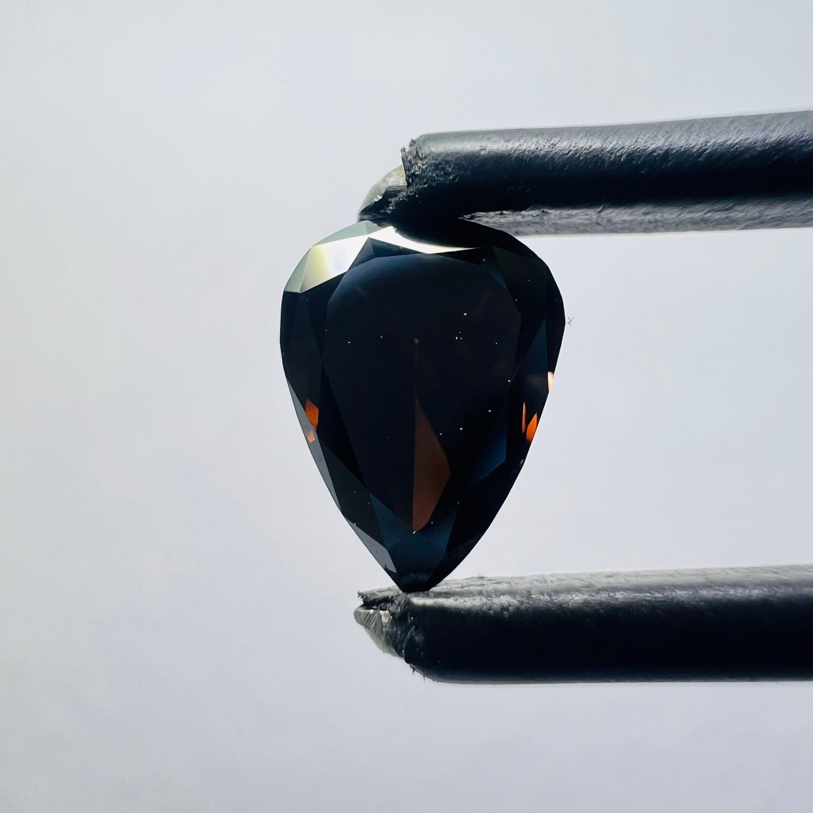 Loose Diamond - PEAR 0.5ct Black I1: Loose Diamond - PEAR 0.5ct Black I1 Source: This is a real non-mined Diamond that has been grown in a lab Shape: PEAR Carats: 0.5 Color: Black Certification: NONE The Diamond Depot Guarantee: All item